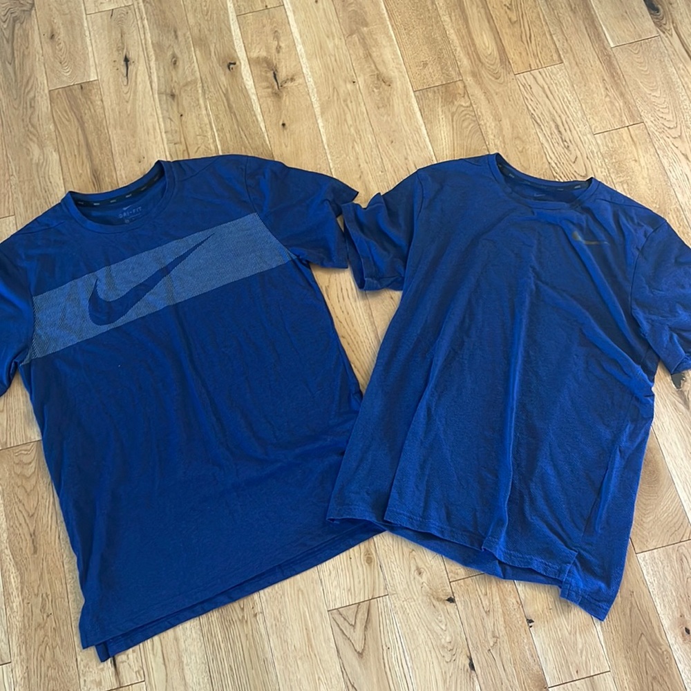 Two Nike mens navy blue shirts. Size medium